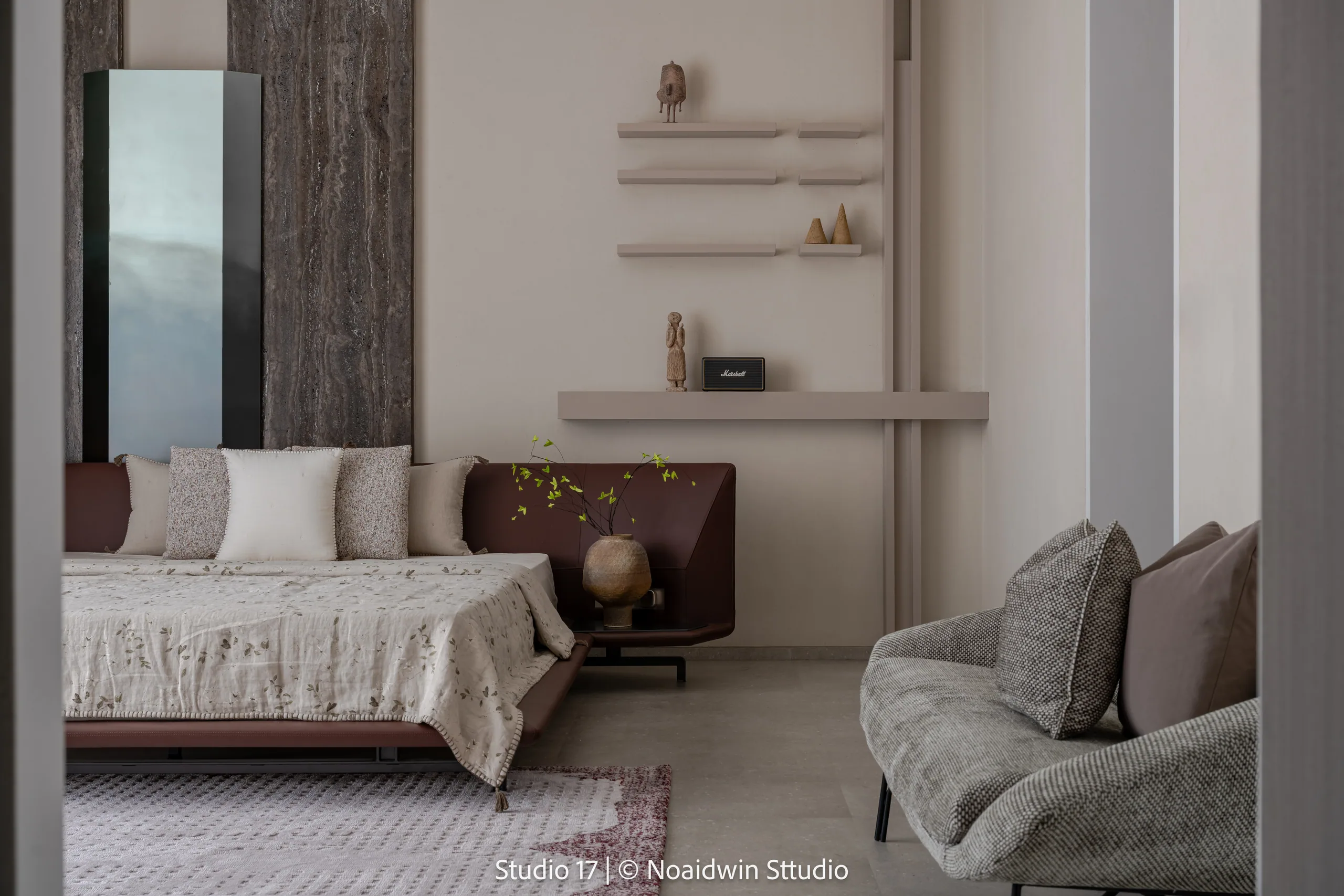 Living room with stone feature wall and layered seating